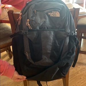 North face recon backpack, rose gold accents